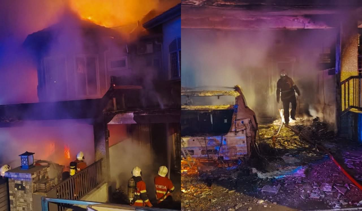 Firefighters responding to a fire that completely destroyed a two-storey terrace house in Alam Damai, Cheras.