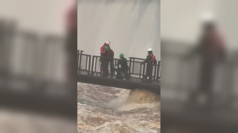 Part of the walkway at Iguaçu Falls, on the Brazilian side, is dismantled due to an extraordinary flooding.