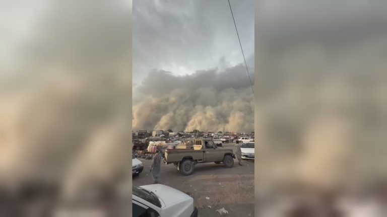 Apocalyptic wall of dust is moving toward a market town in Sistan and Baluchestan
